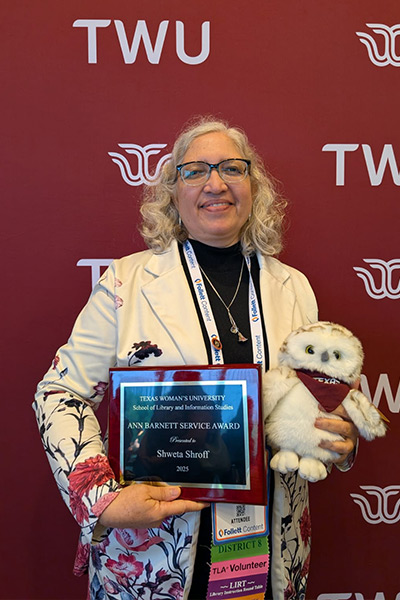 Shweta Shroff smiles with her awards